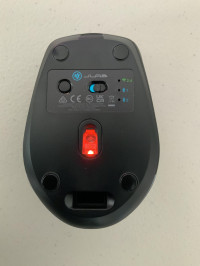 Mini USB stored in the bottom of the mouse