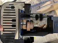 The used coffee nicely stored in machine ready to dispose in pellets!