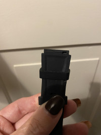 The broken strap- the metal pin broke through the silicone/rubber strap