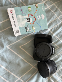 Camera, lens and instruction booklet